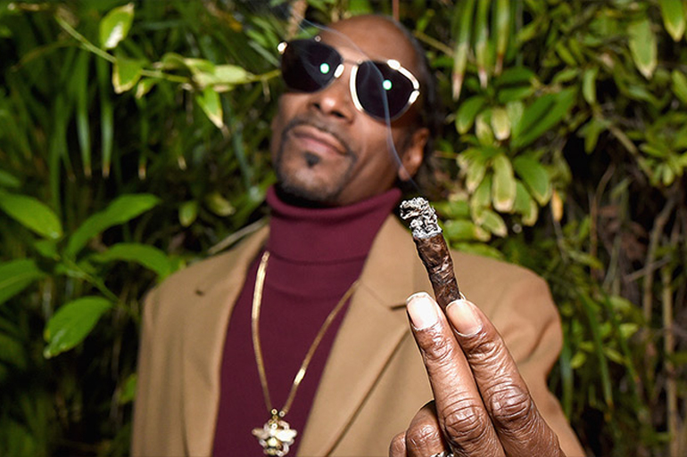Snoop dogg smoking a blunt